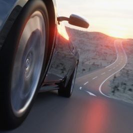performance car driving down country road
